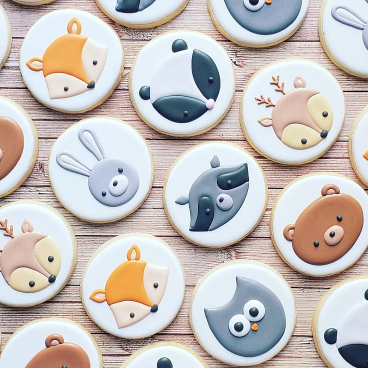 many decorated cookies with animals on them