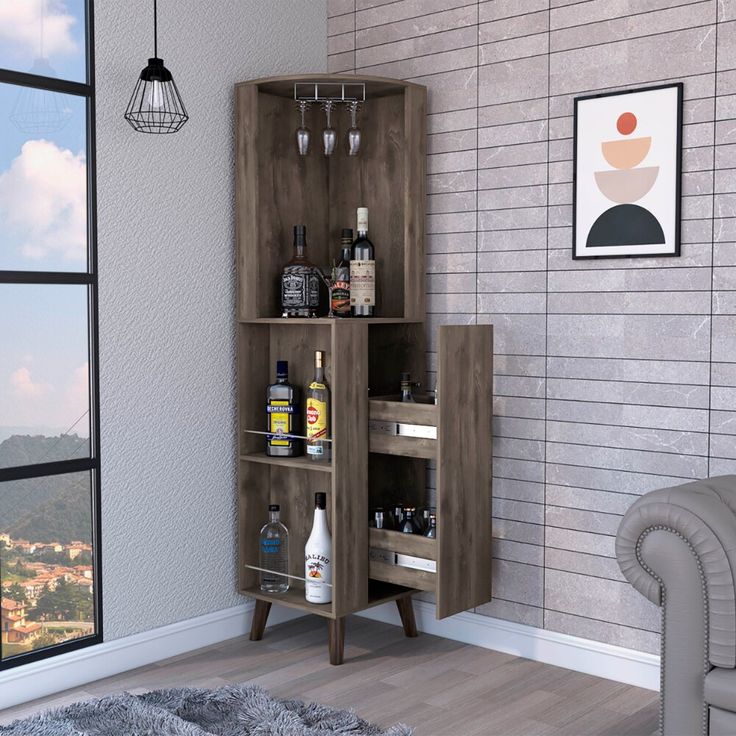 a living room filled with furniture and lots of bottles on top of the shelves in front of a window