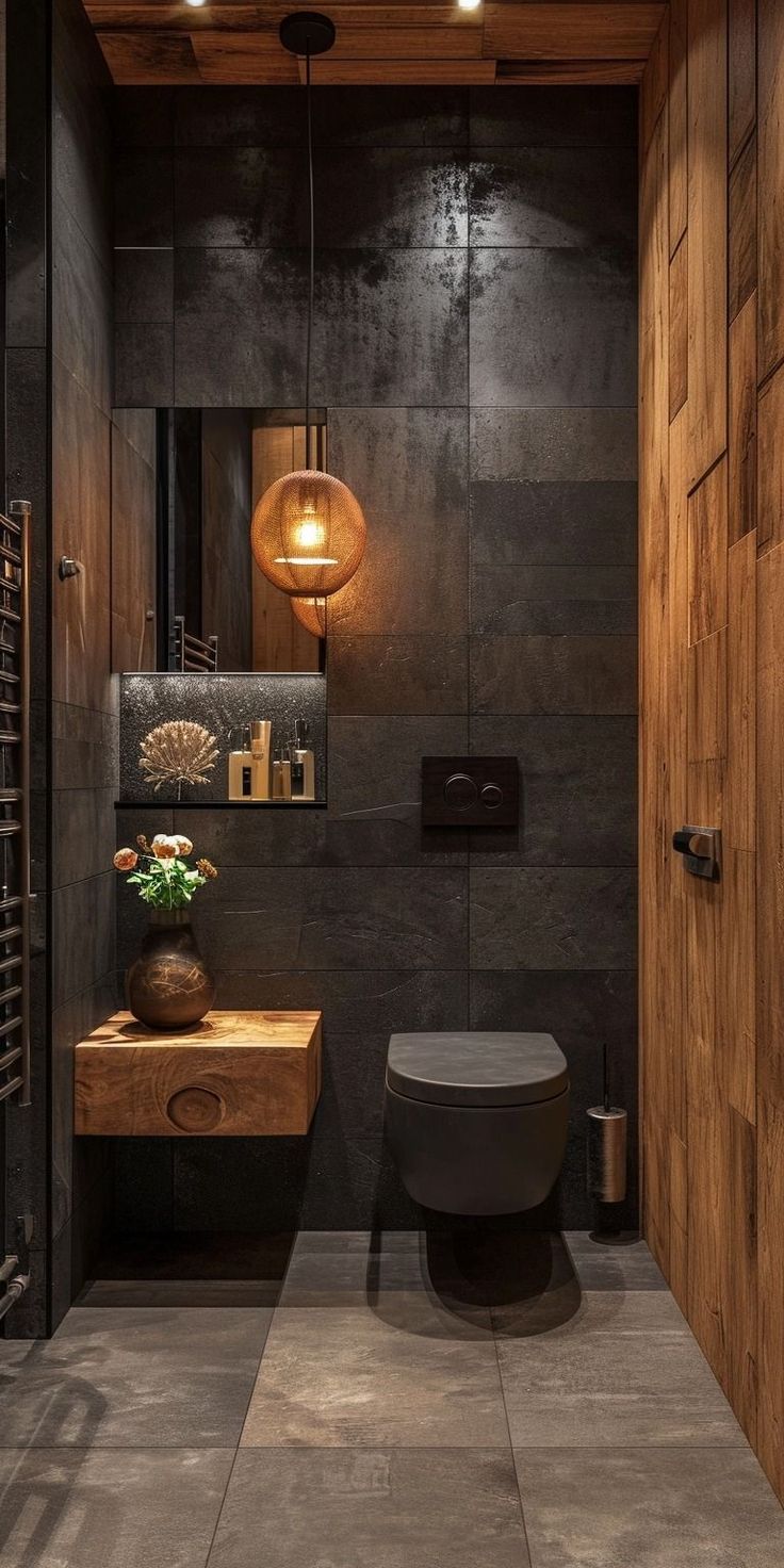 a bathroom with a toilet, sink and wood paneled walls