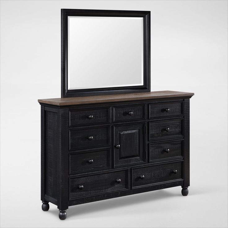 a dresser with a mirror on top of it and drawers below the drawer, in front of a white background