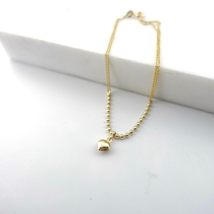 "\"14k Gold Heart Charm Bracelet | Puffy Heart Pendant Bracelet w/ Beaded Gold Ball Chain, Dainty Gift for Woman Daily Use | Gift for Her\" P R O P E R T I E S * Material: 14k Yellow Gold, 14k Rose Gold, 14k White Gold * Charm Dimensions: 0,28\" x 0,24\" // 7mm x 6mm * Ball Diameter: 0,08\" // 2mm (±10%) * Cable Chain Width: 0,04\" // 1mm (±10%) * Weight: 0,063oz // 1,78gr (±10%) * Size: 6\" - 8\" // 15,2cm - 20,3cm (Please contact me for different sizes) ∙ P R O D U C T I O N ∙ ‣ All of our pro Dainty Heart Charm Bracelet With Round Beads, Dainty Jewelry With Heart Charm And Round Beads, Gold Ball Chain Bracelet Gift, Dainty Gold Bracelet With Beaded Chain For Gift, Dainty Gold Bracelet With Beaded Chain As Gift, Gold Jewelry With Heart Charm And Round Beads, Dainty Heart Bracelet With Round Beads, Dainty Ball Chain Bracelet For Gift, Gold Heart Bracelet With Round Beads In Dainty Style