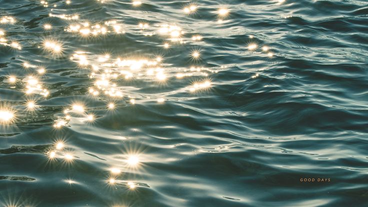 the sun shines brightly on the water surface