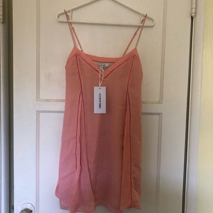 Nice Salmon Color. Size Xs 100% Silk. I Bought It For A Birthday Party But Never Wore It. I’m 5’4 And It Hits Me Mid Thigh. Spring Party A-line Slip Dress, Spring A-line Slip Dress For Party, Spring Mini Length Lined Slip Dress, Spring Lined Slip Sundress, A-line Slip Dress For Date Night In Spring, Spring Mini Slip Dress For Daywear, Spring V-neck Lined Slip Dress, Lined V-neck Slip Dress For Spring, Spring Daywear Mini Dress With Spaghetti Straps