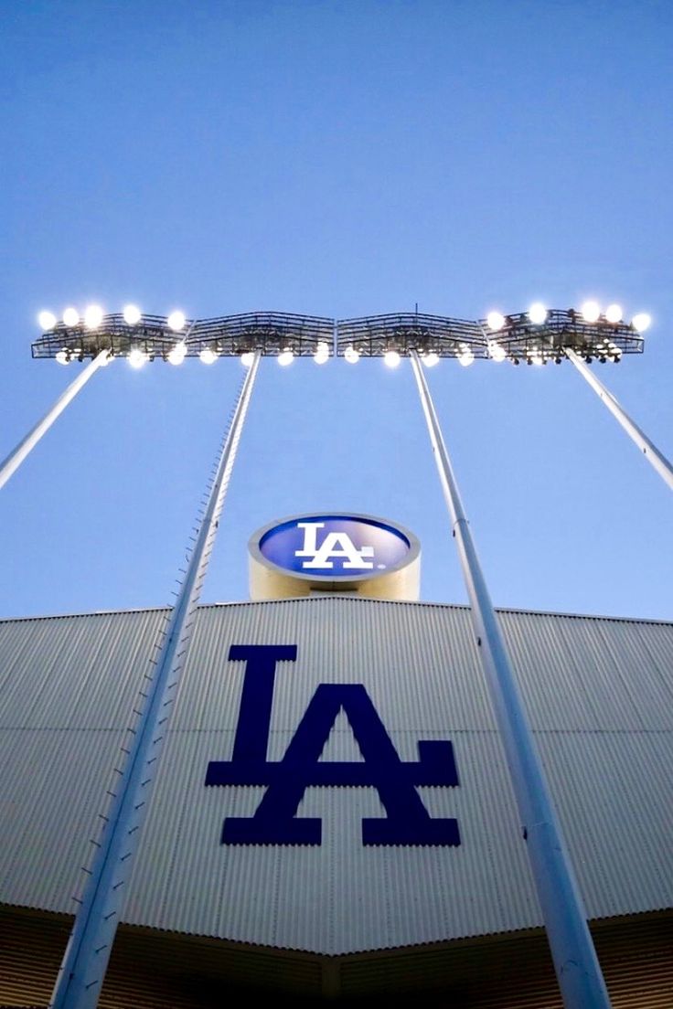 the los angeles dodgers stadium is lit up at night