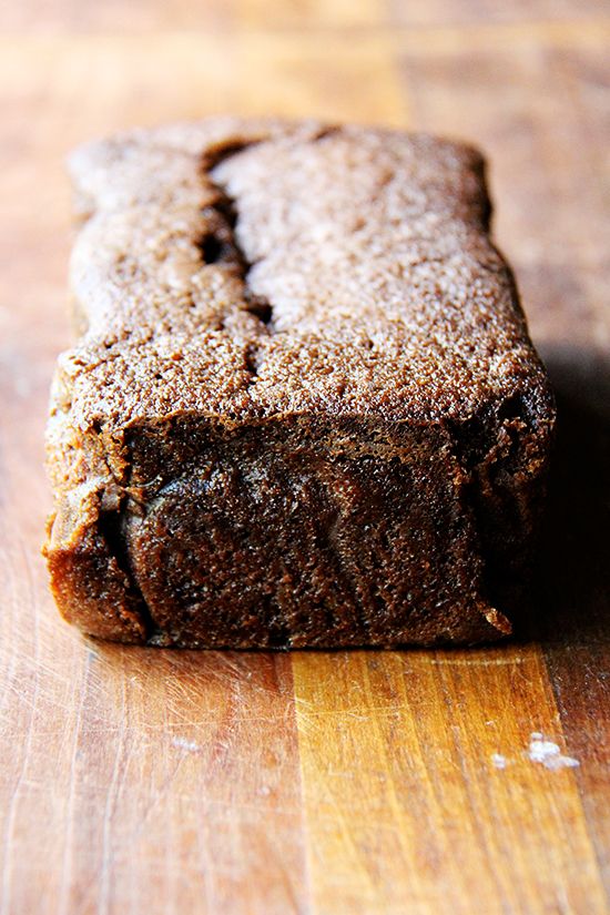 a piece of brownie sitting on top of a wooden table