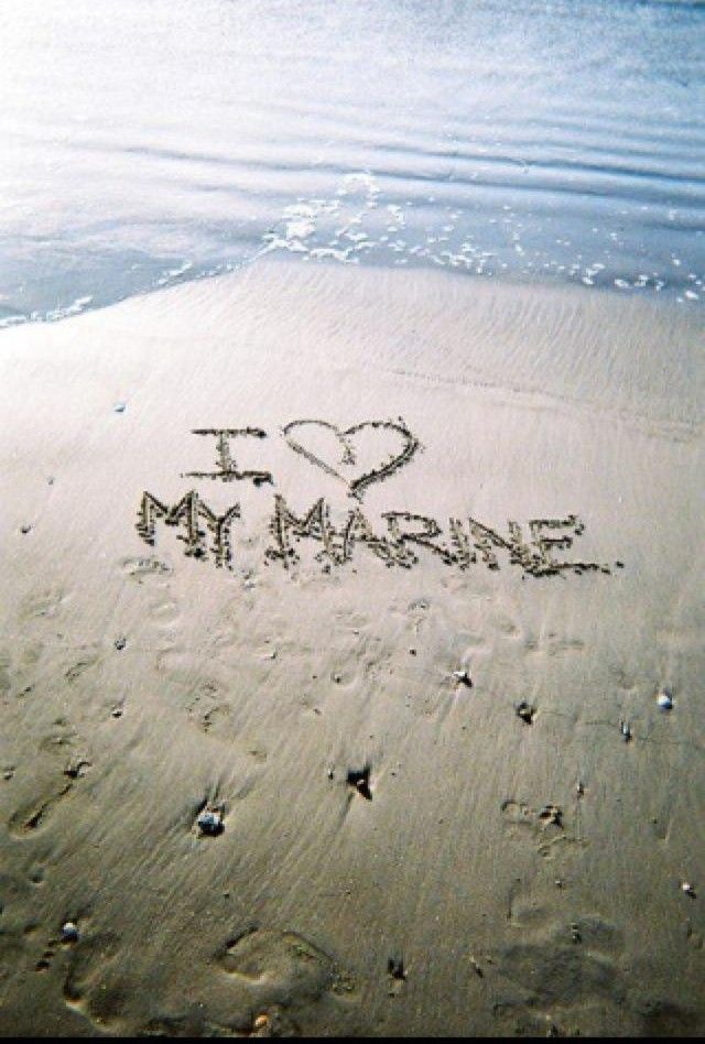 i love my marriage written in the sand at the beach with water and sky behind it