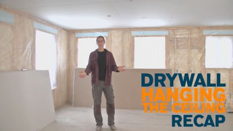 a man standing in an unfinished room with the words drywall hanging the ceiling recap