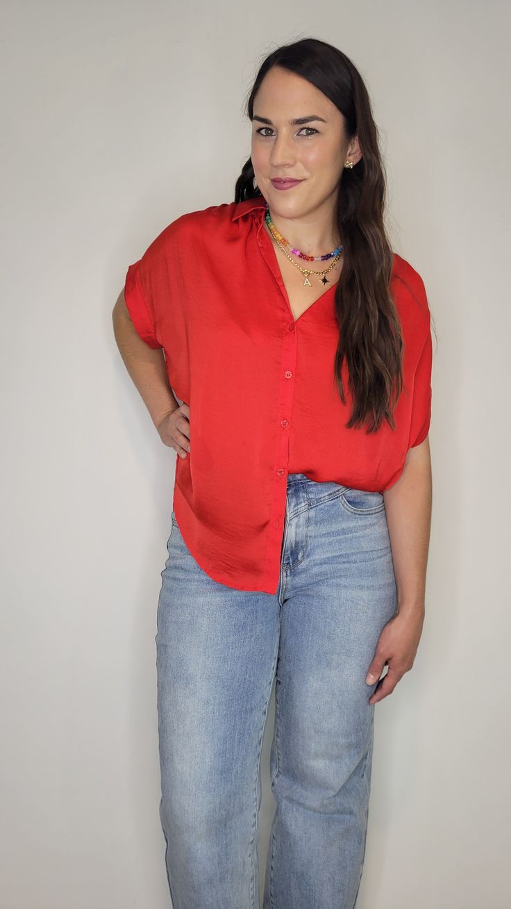 Details: This blouse is a gorgeous! It is is such a pretty red satin. Collared with red buttons. Soft and comfortable material. Cuffed short sleeves. Ruched shoulders. Lightweight and relaxed fit. Swoop hem and longer in the back. It looks great with a french tuck. She looks good with jeans or put her with some dress pants! Materials: 100% Polyester Made In: China Sizing Tip: You can order true to size. It has a pretty relaxed fit but does come in a bit at the hips. If in between size down. I am French Tuck, Satin Button Up, Cuffed Shorts, Red Button, Button Up Top, Red Satin, Outerwear Sweater, Dress P, Dress Pants