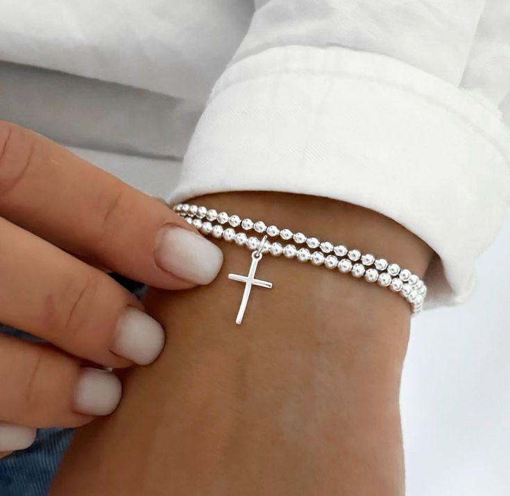 925 Sterling Silver Cross Charm Bracelet 3mm Sterling Silver Beads  9x15mm Sterling Silver Cross Charm Stack of 2 includes: one Cross Charm Bracelet one 3mm Plain Bracelet *PRICE SHOWN IS FOR 1 CROSS CHARM BRACELET ONLY* Sterling Silver Bracelets With 8mm Beads For Gift, Sterling Silver 8mm Beads Bracelet As Gift, Silver Rosary Bracelet With 8mm Beads As Gift, Silver Sterling Silver Beaded Bracelets With 8mm Beads, Silver Sterling Silver Bracelet With 8mm Beads, Silver Dainty Rosary Bracelet With Round Beads, Silver Pearl Bracelet With 8mm Beads For Gift, Silver Pearl Bracelet With 8mm Beads As Gift, Dainty Silver Rosary Bracelet With Round Beads