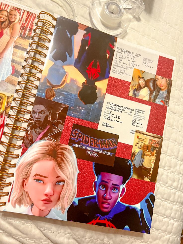 an open notebook with pictures of people on it and the words spider - man written in red