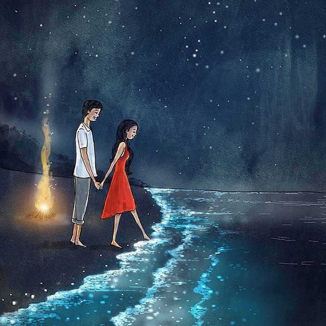 two people standing on the edge of a body of water at night, holding hands