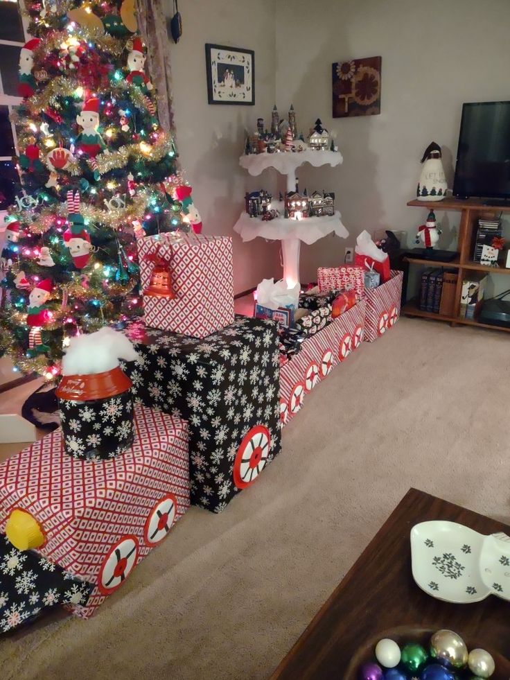 a living room filled with lots of presents under a christmas tree