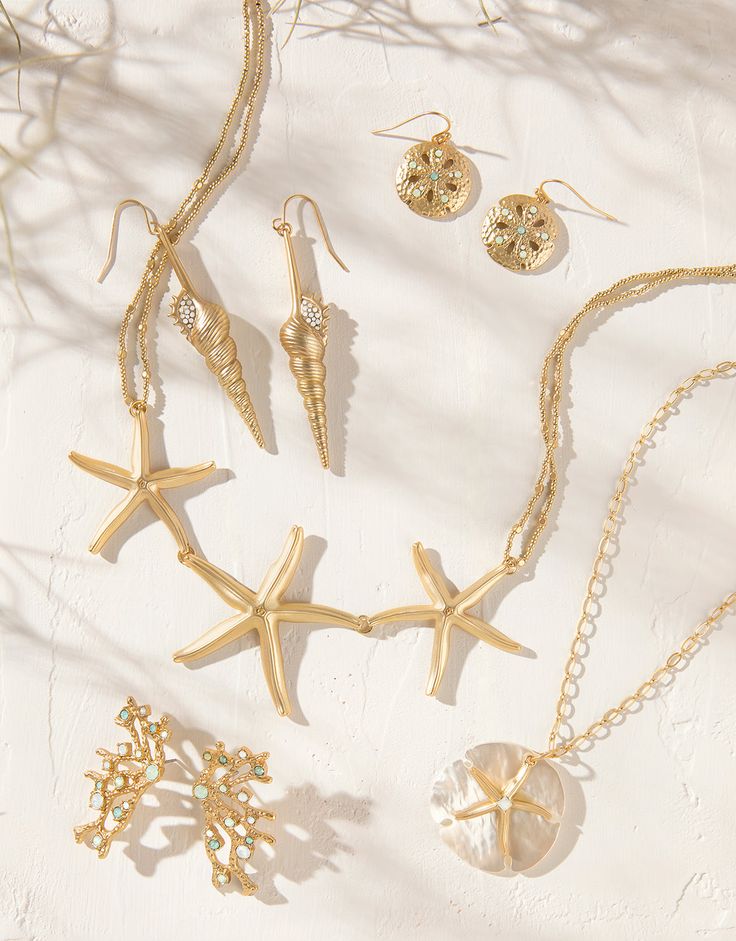 Calling all beachcombers! The fun of the hunt is right here in our Coastal Jewelry Collection, a wonderland of golden coral branches, crystal opals adorning the centers of sea stars and freshwater pearls nestled into crabs, moon shells and sand dollars. Sand Dollar Earrings, Star Sand, Sand Dollar Necklace, Coastal Jewelry, Shells And Sand, Sea Stars, Sand Dollars, Gold Statement Earrings, Gold Statement Necklace