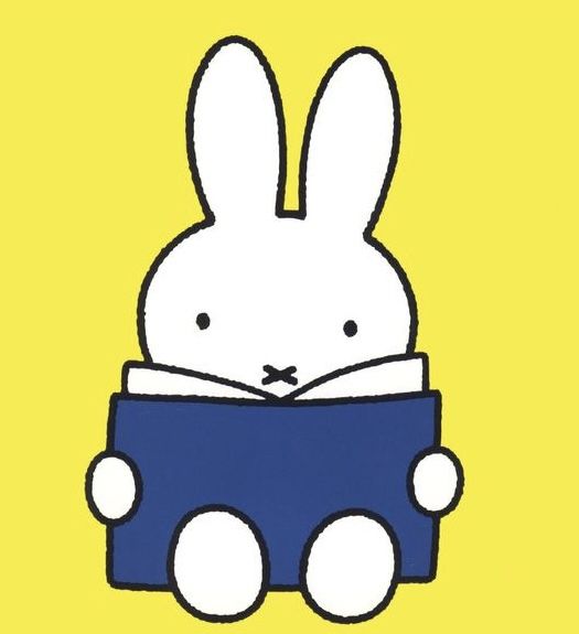 a white rabbit sitting on top of a blue car in front of a yellow background