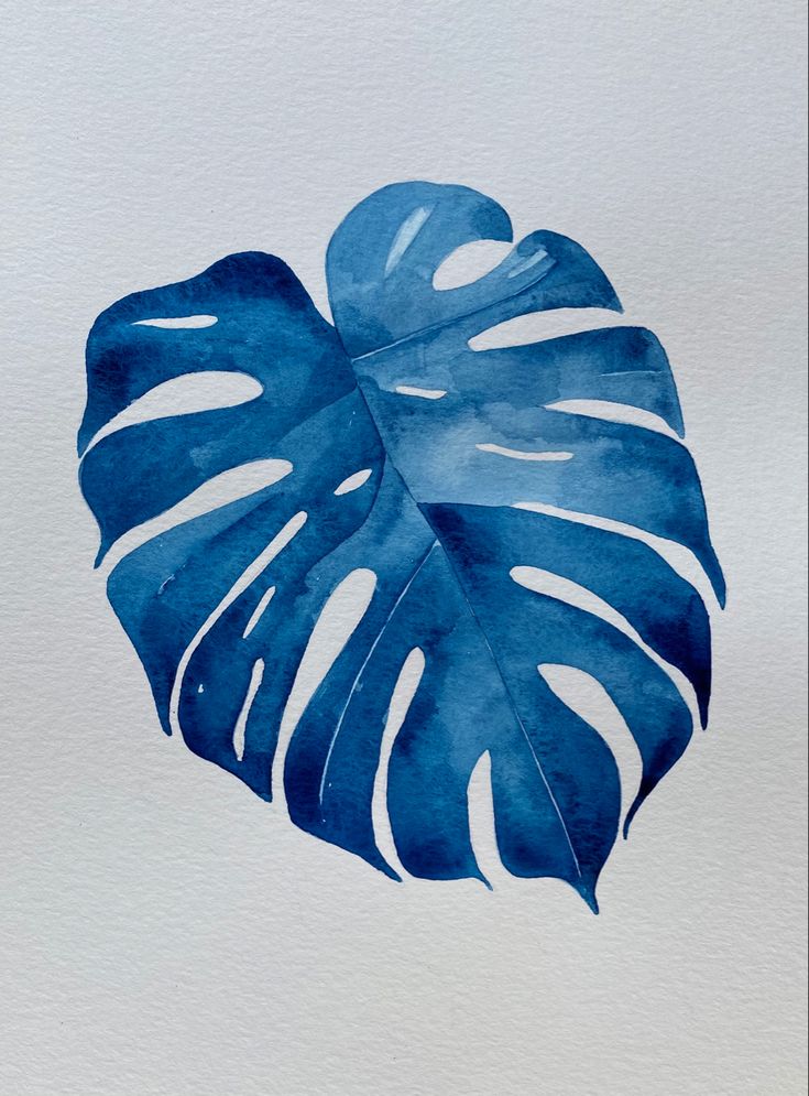 a watercolor painting of a blue and white monster's leaf on a white background