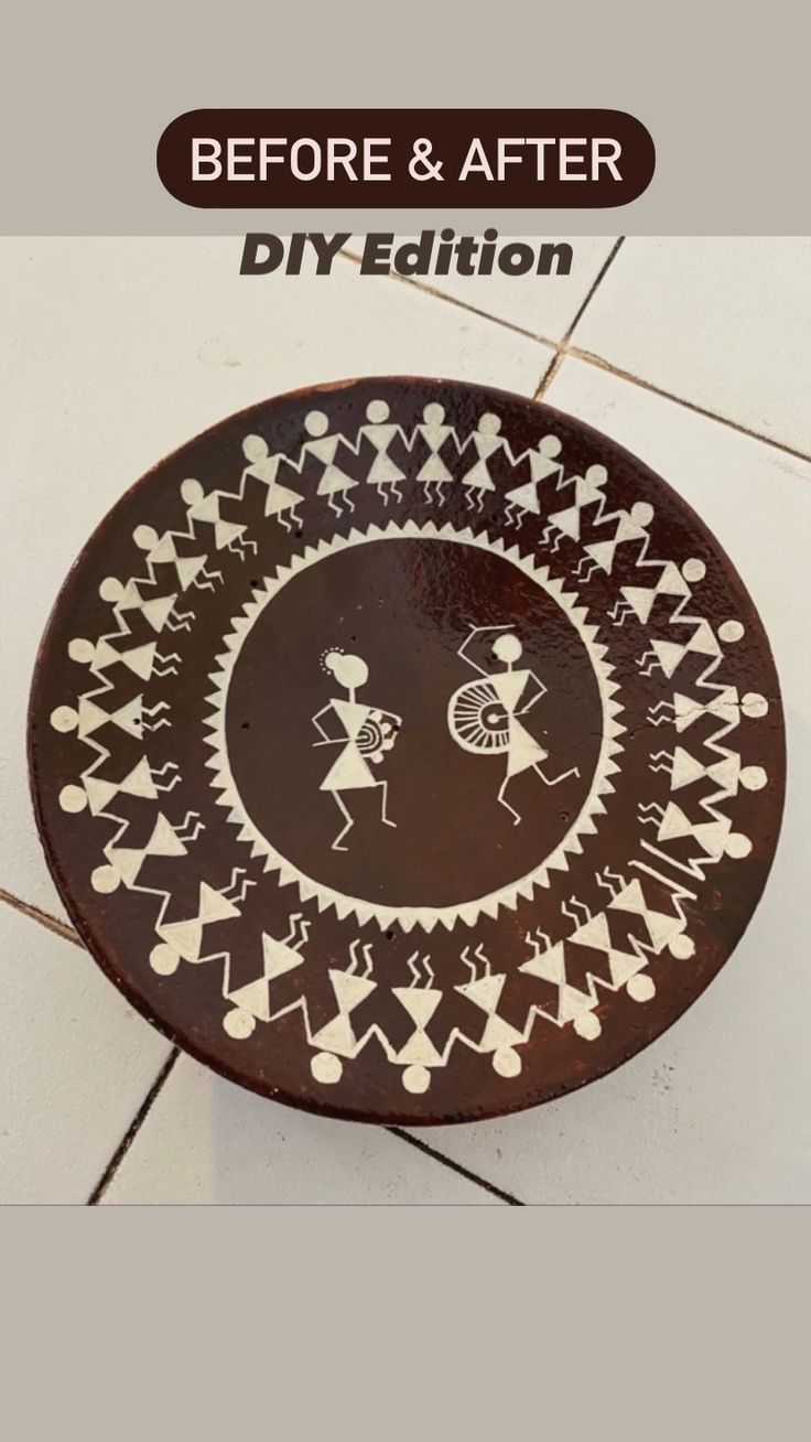 a brown and white plate sitting on top of a tiled floor