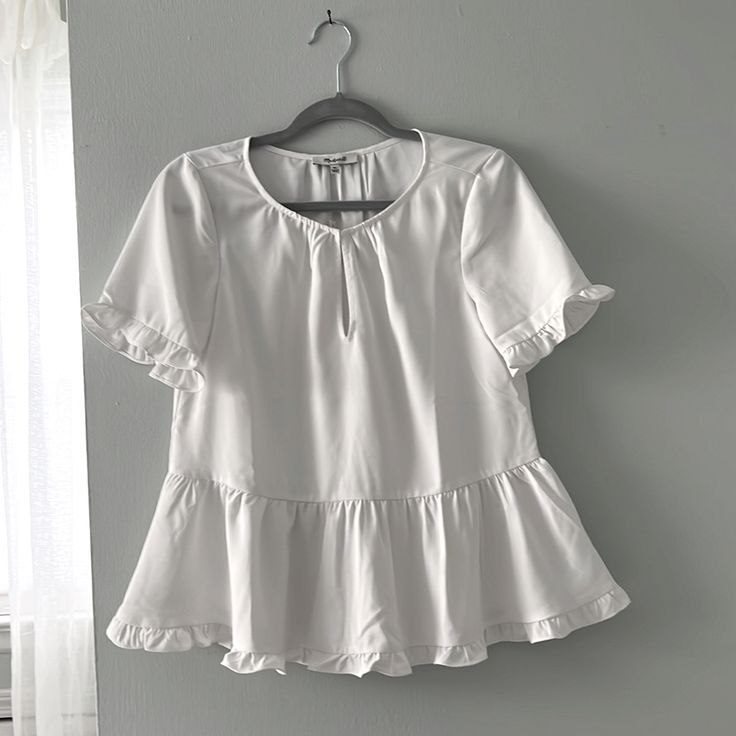 Super Cute, True White, Peplum Top! Never Worn. With Tags. Top Features A Hook-And-Eye Closure At The Front Which Is Hidden When Un-Hooked. Peplum Blouse With Ruffle Hem For Brunch, Chic Short Sleeve Blouse With Ruffle Hem, Peplum Top With Ruffles For Workwear, Ruffled Peplum Top For Workwear, Ruffled Peplum Tops For Work, Chic Short Sleeve Blouse For Brunch, Casual Workwear Blouse With Ruffle Hem, Casual Blouse With Ruffle Hem For Workwear, Peplum Blouse With Ruffle Hem For Work