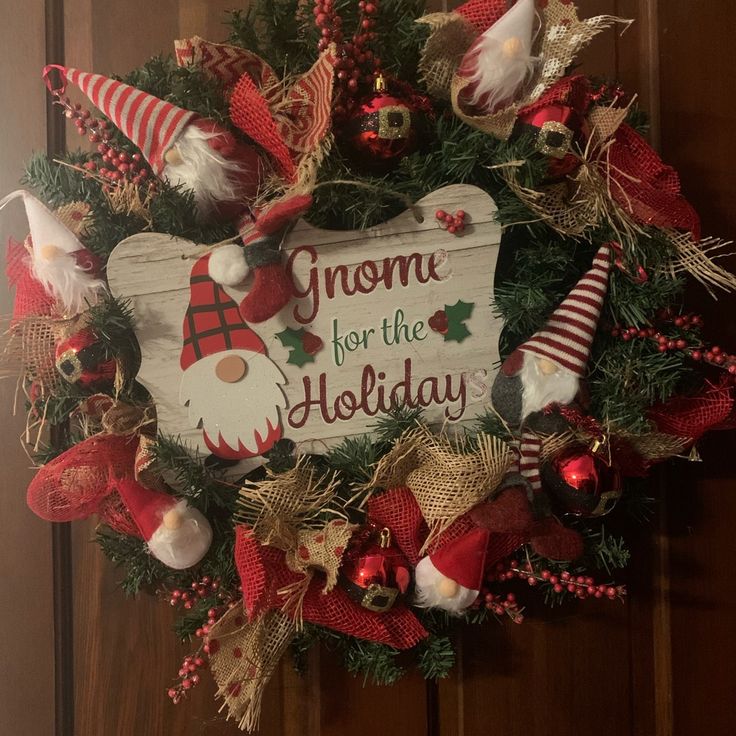 a christmas wreath with gnomes and ornaments on it that says gnome for the holiday