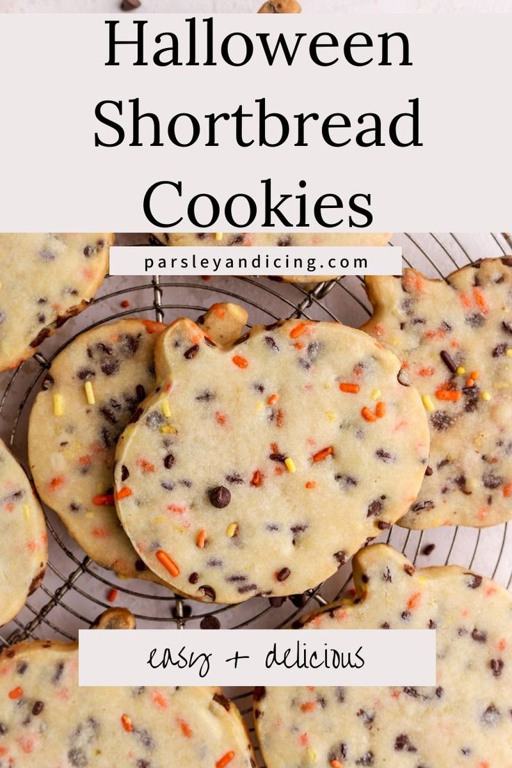 halloween shortbread cookies with chocolate chips and sprinkles on a cooling rack