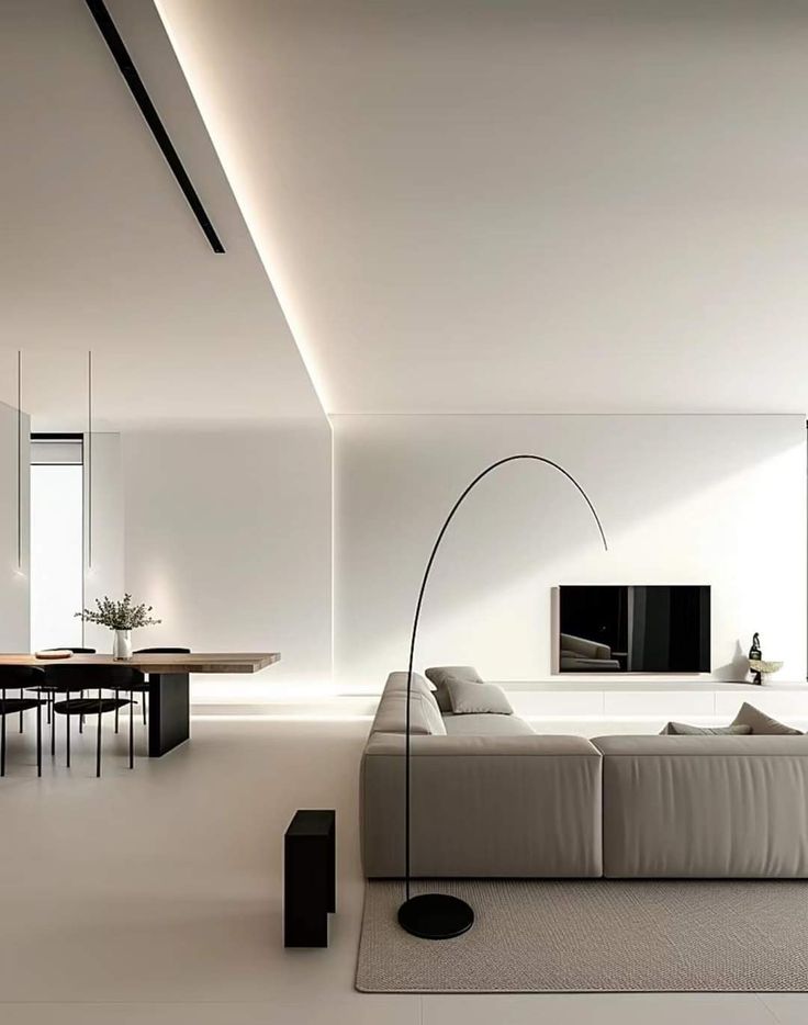 a modern living room with white walls and flooring