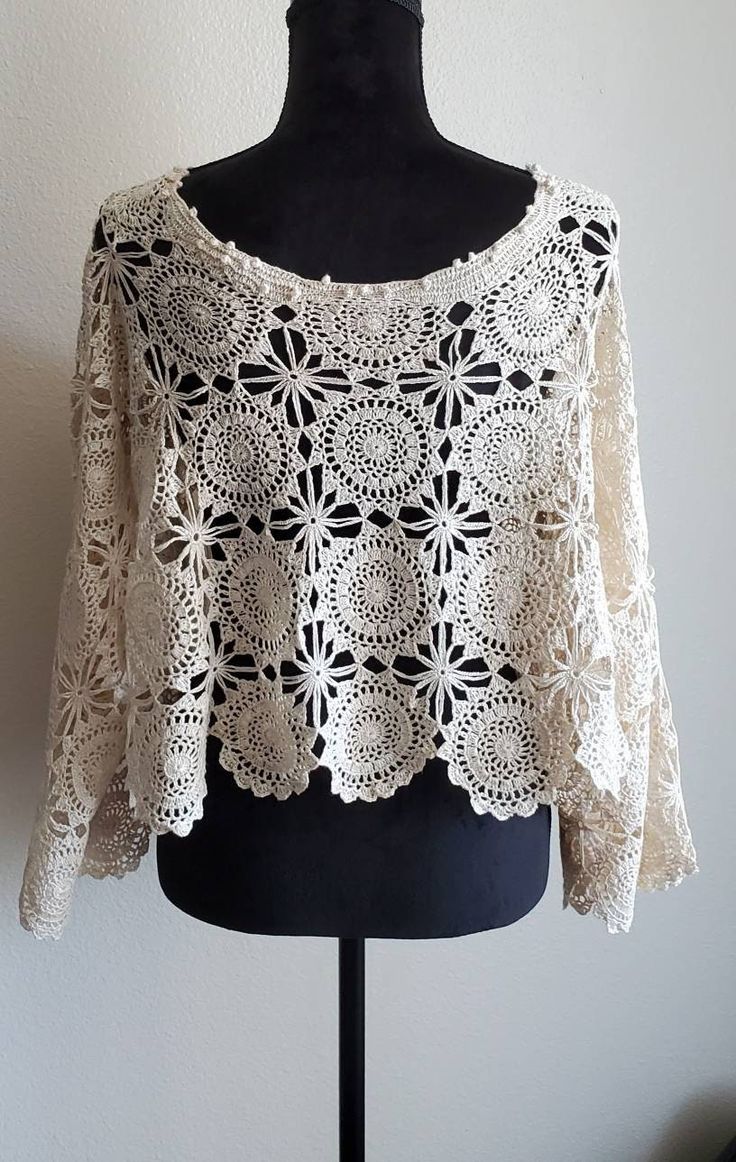 A timeless peace.. A life saver... A romantic... Everything looks chic and elegant under this beauty... Bohemian Cream Crochet Top With Crochet Trim, Bohemian Cream Lace Top With Crochet Trim, Bohemian Cream Crochet Lace Top, Beige Bohemian Crochet Lace Top, Bohemian Beige Lace Crochet Top, Beige Bohemian Lace Crochet Top, Beige Lace Bohemian Crochet Top, Bohemian Crochet Lace Top, Handmade Bohemian Lace Crochet Top