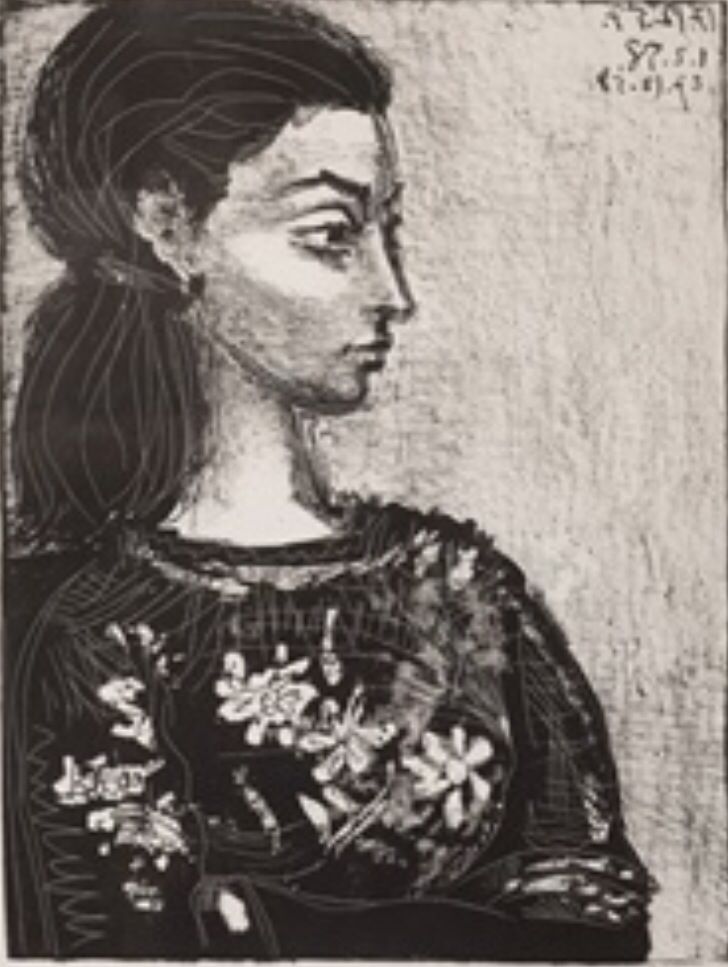 a black and white drawing of a woman's face with flowers in her hair