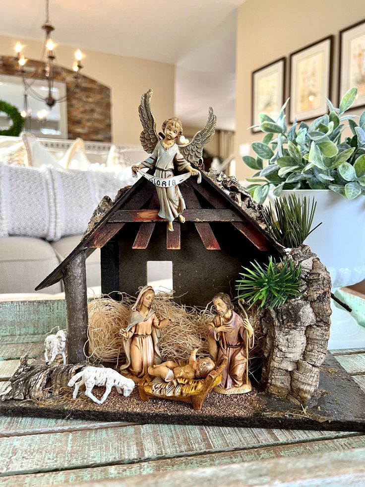 a nativity scene with figurines on a table