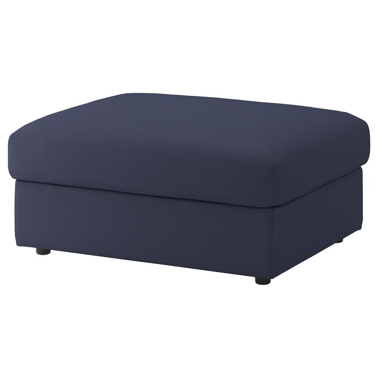 the footstool is made from fabric and has a dark blue cover on it