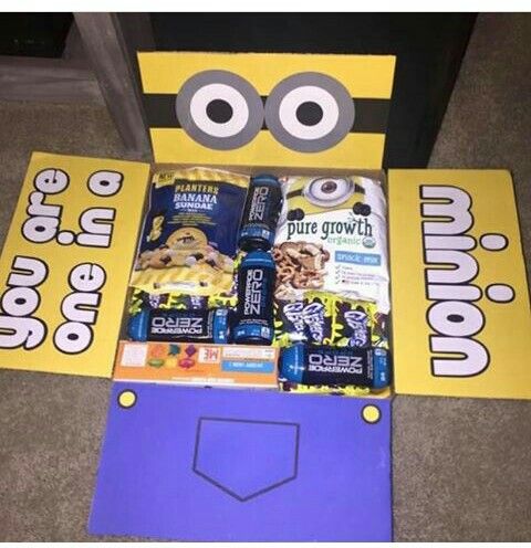 a cardboard cut out of a minion sitting on top of a carpeted floor