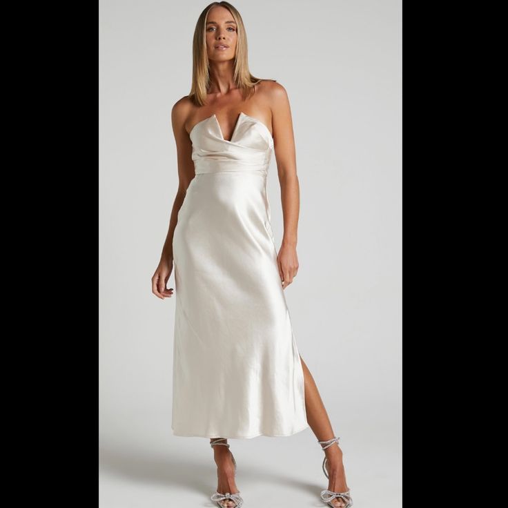 New With Tags! Showpow Jaslynn Strapless Midi Dress. Color: Champagne. Satin Material. Size Large (12) - Runs Small. This Dress Measures 38” Bust, 39” Hips, 28” Waist White Strapless Slip Dress For Party, White Strapless Slip Dress For Night Out, Chic White Strapless Slip Dress, Elegant Strapless V-neck Dress For Spring, Chic Strapless Slip Dress For Dinner, Chic White Slip Dress For Dinner, White Slip Dress With Sweetheart Neckline For Evening, Strapless Slip Dress For Spring Formal, White Midi Dress With Sweetheart Neckline For Night Out