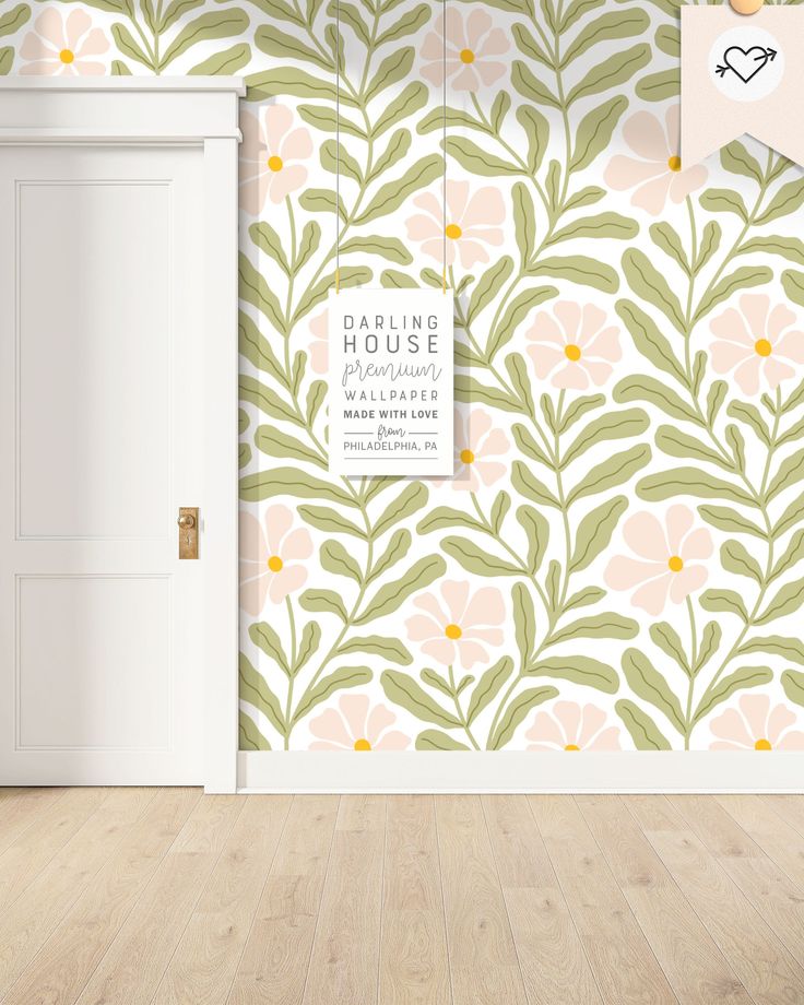 an open door in front of a floral wallpapered room with pink and green flowers