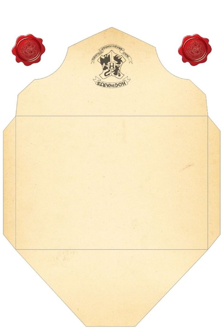 a piece of paper with two red roses on it and an envelope in the middle