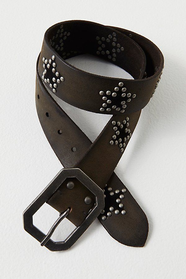 Add necessary embellishment to any look with this soft leather belt, featured in a medium width with studded stars and a classic buckle closure. **Features:** Soft leather fabrication, pointed tip, studded star detail, metal buckle with distressed finish **Why We ❤ It:** This star-studded belt can be worn to cinch your waist or to adorn your favorite pair of jeans. | Starcrossed Studded Belt by Free People in Black, Size: S/M Rock Star Accessories, Studded Belts, Star Belt, Cool Belt, Cowboy Belt, Free People Accessories, Studded Jeans, Clothes Diy, Belt Design