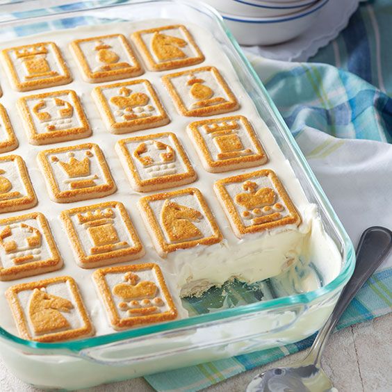 a cake in a glass baking dish on a table