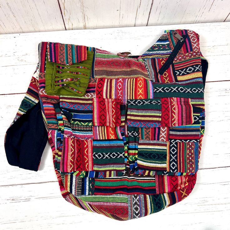 Elevate your bohemian style with our Handmade Gheri Cotton Patchwork Sling Bag, a unique and colorful accessory designed for those who appreciate artistry and functionality.Artisanal Craftsmanship: Handcrafted with care, each bag features a distinctive patchwork design using Gheri cotton, known for its durability and vibrant patterns. Multi-Pocket Design:Stay organized on the go with multiple pockets. This sling bag includes a spacious main compartment, two front pockets with Velcro closure, one Colorful Patchwork Shoulder Bag For Daily Use, Multicolor Cotton Hobo Shoulder Bag, Multicolor Patchwork Hobo Bag For Daily Use, Daily Use Multicolor Patchwork Hobo Bag, Multicolor Patchwork Crossbody Shoulder Bag, Multicolor Cotton Hobo Bag For Travel, Colorful Patchwork Shoulder Bag For Everyday Use, Bohemian Patchwork Cotton Shoulder Bag, Bohemian Cotton Patchwork Shoulder Bag