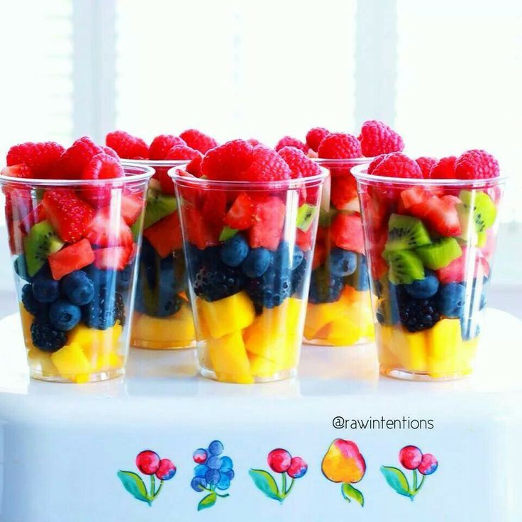 several cups filled with different types of fruit