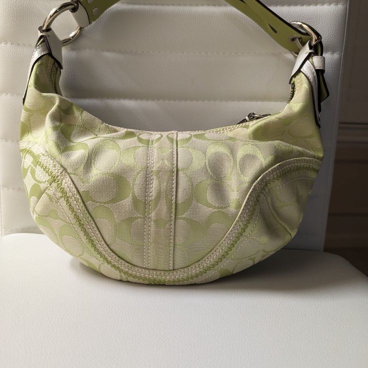 Vintage Green Coach Bag, Coach Bags For Everyday Spring Use, Coach Everyday Bags For Spring, Spring Coach Everyday Bags, Spring Coach Bags For Everyday Use, Designer Bags For Everyday Use In Spring, Green Coach Bag With Removable Pouch, Green Coach Bags With Silver-tone Hardware, Green Coach Bags With Removable Pouch