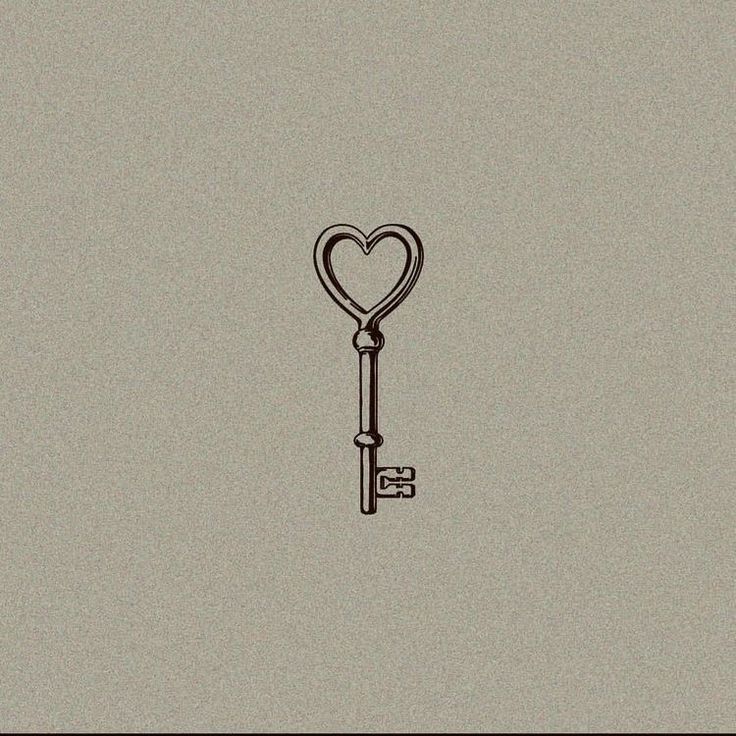 a drawing of a key with a heart on the end and a keyhole in the middle