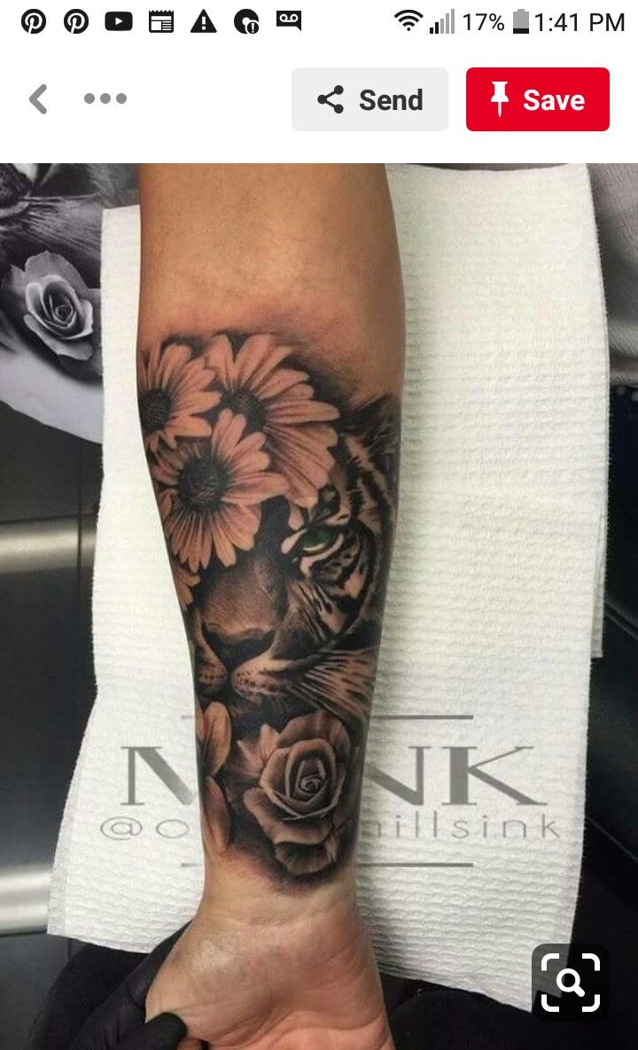 a person with a flower tattoo on their arm