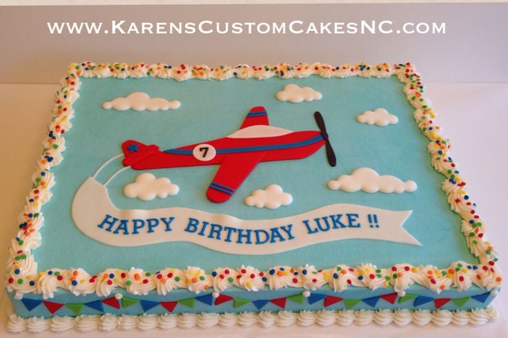 a birthday cake with an airplane on it