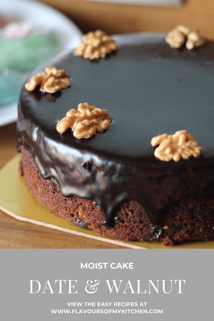 a chocolate cake with walnuts on top