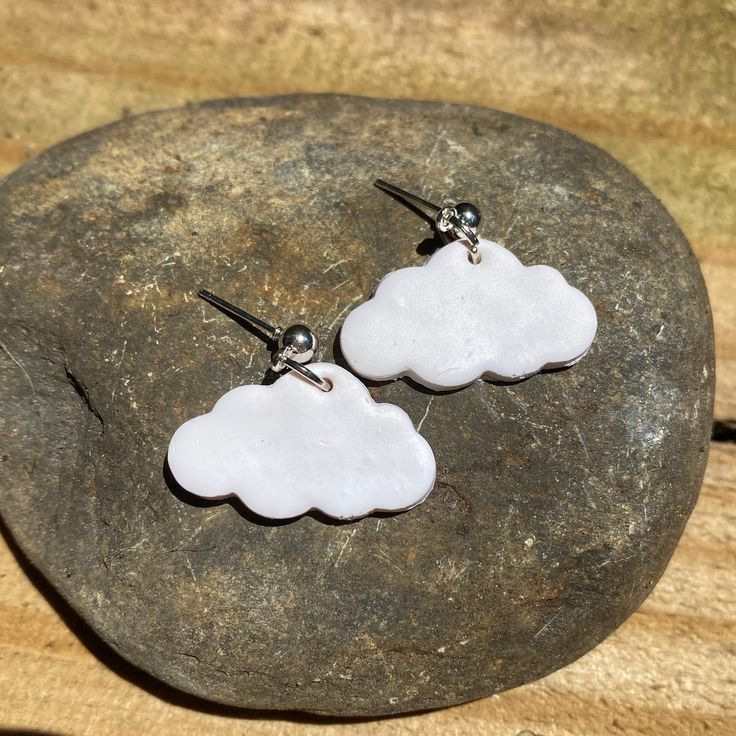 Silver dangle white cloud earrings, polymer clay, handmade Handmade White Resin Earrings, Cute White Dangle Earrings, Cute White Earrings For Everyday, Cute White Earrings For Everyday Wear, White Dangle Earrings In Polymer Clay, White Polymer Clay Dangle Earrings, White Polymer Clay Earrings With Ear Wire, Cloud Earrings, Earrings Polymer