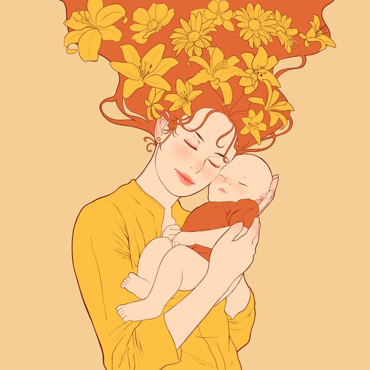 a woman holding a baby in her arms with yellow flowers on the top of her head