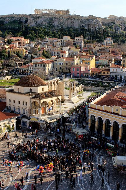 an aerial view of a city with many people