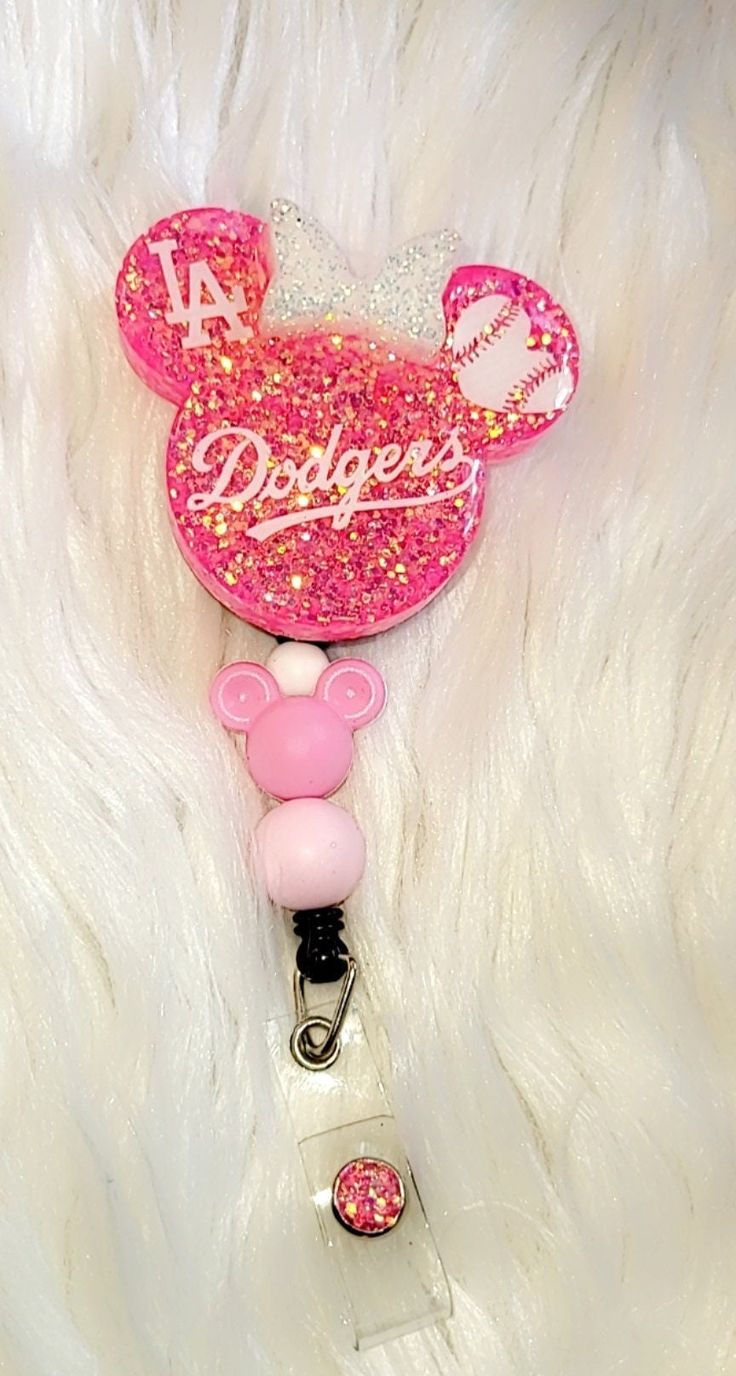 LA Dodgers Badge Reel available with beads on a mouse head or Phone Grip. Badge reels are attached with 3M dual lock velcro and are interchangeable. If you prefer a permanent glue please send me a note when you purchase. Comes with Alligator clip. Slide clip available upon request. Care instructions: Please avoid dropping, while items are durable they are not indestructible. Please handle with care. RETURNS/EXCHANGES: Due to all items being personalized and made to order we do not accept returns Badge Reels Diy, Diy Uv Resin, Keychain Craft, Book Markers, Id Badge Reels, Beaded Lanyards, Phone Grips, Id Holder, Badge Holders Lanyard