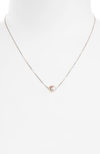 Nothing expresses understated elegance quite like pearls. This delicate pendant necklace has a slender chain and a single, luminous cultured pearl. 16" length; 2" extender; 3/8"W x 3/8"L pearl pendant Lobster clasp closure Pearl size: 8mm Akoya cultured pearl/18k white gold Handcrafted in Japan Asian Owned Elegant Single Strand Pearl Pendant Necklace, Elegant Single Strand Pendant Pearl Necklace, Minimalist Single Strand White Gold Pearl Necklace, Minimalist White Gold Single Strand Pearl Necklace, White Pearl Necklace With Delicate Chain For Formal Occasions, Delicate White Gold Pearl Drop Necklace, Dainty White Gold Single Strand Pearl Necklace, Dainty White Gold Pearl Drop Necklace, Elegant Solitaire Necklace With Cable Chain