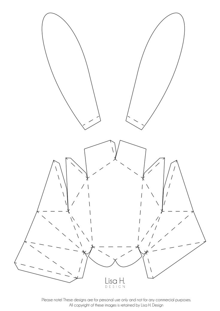 the paper bunny's ears are cut out and placed on top of each other