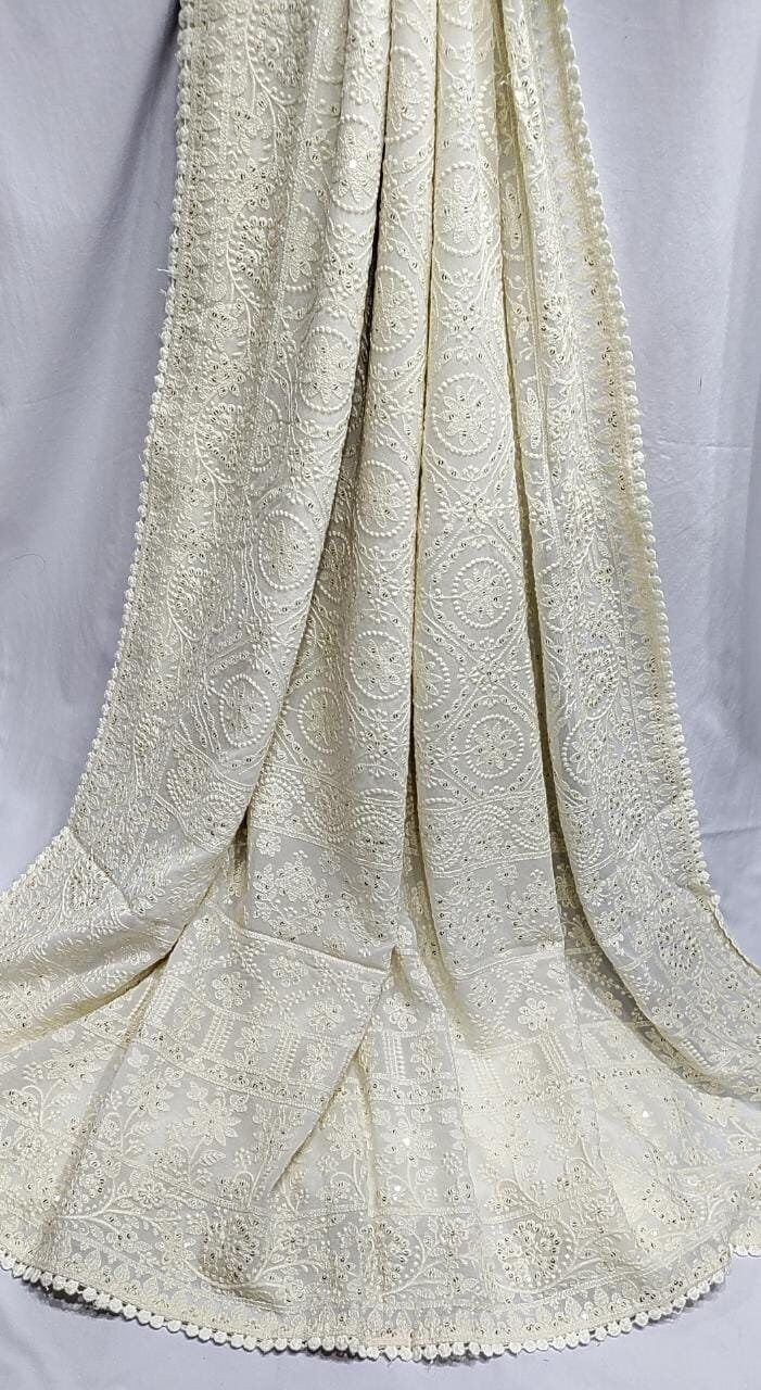 Georgette chikankari saree. Bohemian Chikankari Embroidery Dupatta For Wedding, Bohemian Traditional Saree With Chikankari Embroidery, Bohemian Chikankari Embroidered Saree For Diwali, Bohemian Saree With Chikankari Embroidery For Diwali, Bohemian Dupatta With Chikankari Embroidery, Elegant Cream Saree With Chikankari Embroidery, Off White Chikankari Embroidery Dupatta For Diwali, Bohemian Mulmul Dupatta With Chikankari Embroidery, Elegant Off White Saree With Chikankari Embroidery