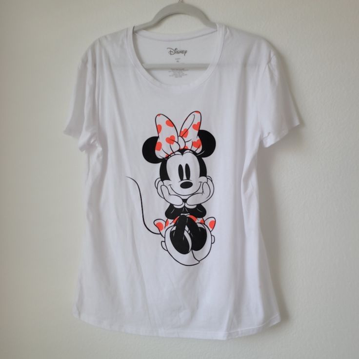 New Without Tags Tshirt White Armpit To Armpit 21.5 Inches Shoulder To Hem 28 Inches 60% Cotton 40% Polyester Questions? Leave A Comment Below! White Mickey Mouse Crew Neck T-shirt, Minnie Mouse Graphic Tee Short Sleeve, White Crew Neck T-shirt With Mickey Mouse, Minnie Mouse Graphic Tee Short Sleeve Top, White Mickey Mouse T-shirt, White Minnie Mouse Graphic Tee, Cotton Minnie Mouse T-shirt With Short Sleeves, Cotton Minnie Mouse Short Sleeve T-shirt, Minnie Mouse Cotton T-shirt