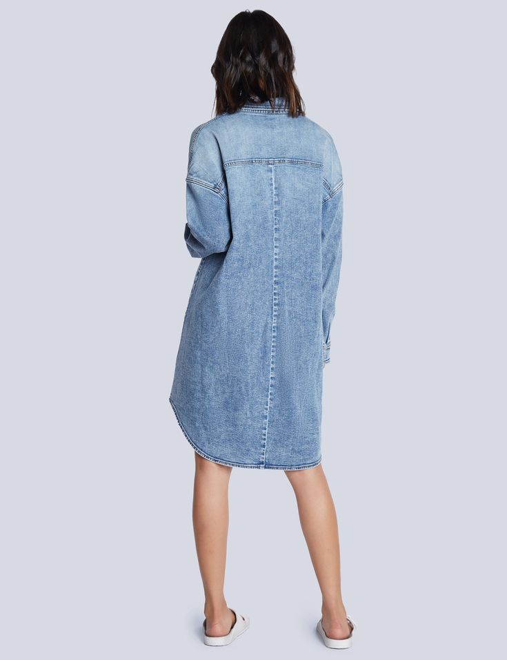 This utility shirtdress is cut from stretchy denim and meant to be worn whenever you're feeling extra-cute and carefree - AKA, everyday! Summer Denim Washed Shirt Dress, Relaxed Fit Chambray Denim Dress In Medium Wash, Relaxed Fit Denim Blue Chambray Dress, Relaxed Fit Chambray Denim Dress, Chambray Denim Dress With Relaxed Fit, Oversized Long Sleeve Denim Dress In Medium Wash, Trendy Collared Denim Dress In Relaxed Fit, Oversized Long Sleeve Medium Wash Denim Dress, Trendy Relaxed Fit Collared Denim Dress